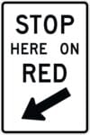 R10 6 stop here on red left arrow sign